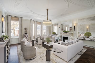 The reception rooms in the 7,948-square foot property have parquet flooring and elegant Regency-style marble fireplaces. Photo: Beauchamp Estates