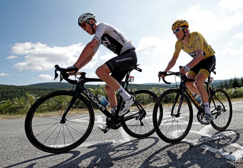 Cycling - Tour de France - The 181.5-km Stage 15 from Millau to Carcassonne - July 22, 2018 -  Team Sky riders Chris Froome of Britain and Geraint Thomas of Britain, wearing the overall leader's yellow jersey, in action. REUTERS/Benoit Tessier