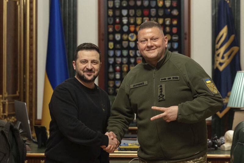 President Volodymyr Zelenskyy said he wanted General Valeriy Zaluzhny (right) to remain part of Ukraine's efforts to see off Russian forces. AFP