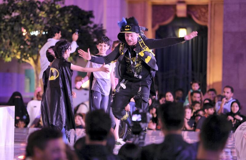 ABU DHABI ,  UNITED ARAB EMIRATES , SEPTEMBER 21 – 2019 :- Kids playing games and taking part in the Guinness World Record for the Batman’s 80th anniversary held at Warner Bros  in Abu Dhabi. ( Pawan Singh / The National ) For News/Online/Instagram