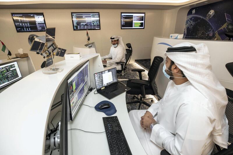 DUBAI, UNITED ARAB EMIRATES. 27 JULY 2020. MBRSC headquarters in Al Khawaneej. One week today since the Hope probe launched to Mars. LtoR: Mohammed Alblooshi, Flight Controller and Hamad Alhazami, Command and Control operator. (Photo: Antonie Robertson/The National) Journalist: Sarwat Nasir. Section: National.