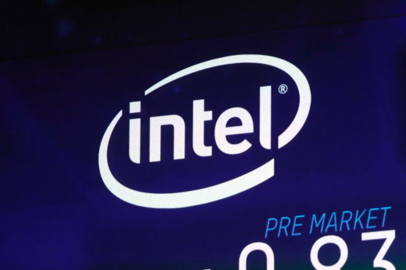 FILE - In this Oct. 3, 2018, file photo the Intel logo appears on a screen at the Nasdaq MarketSite, in New York's Times Square. Intel has revealed another hardware security flaw that could affects millions of machines around the world. The chipmaker said Tuesday, May 14, 2019, that thereâ€™s no evidence of bad actors exploiting the bug, which is embedded in the architecture of computer hardware. (AP Photo/Richard Drew, File)