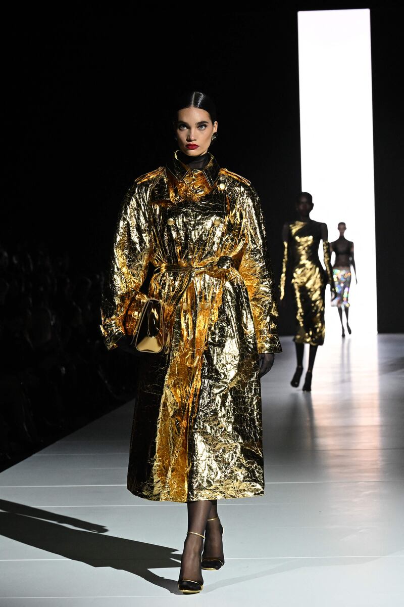 A lavish gold coat at Dolce & Gabbana. AFP