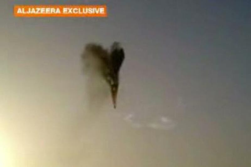 In this image taken from amateur video provided by Al-Jazeera, a hot air balloon over Luxor, Egypt bursts before plummeting about 1,000 feet to earth on Tuesday, Feb. 26, 2013. Nineteen people were killed in what appeared to be the deadliest hot air ballooning accident on record. A British tourist and the Egyptian pilot, who was badly burned, were the sole survivors. (AP Photo/Al-Jazeera) MANDATORY CREDIT: AL-JAZEERA *** Local Caption ***  Egypt-Balloon Accident.JPEG-03b67.jpg