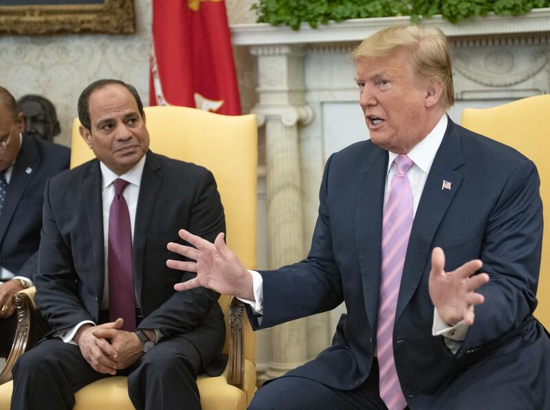 U.S. President Donald Trump, right, speaks as Abdel-Fattah El-Sisi, Egypt's president, listens during a meeting at the Oval Office of the White House in Washington, D.C., U.S., on Tuesday, April 9, 2019. Trump downplayed his personnel moves at the Department of Homeland Security, saying he is fighting "bad laws" on immigration and obstruction in Congress. Photographer: Ron Sachs/Pool via Bloomberg