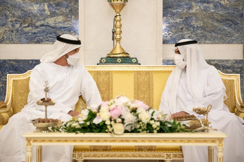 FUJAIRIAH, UNITED ARAB EMIRATES - May 15, 2021: HH Sheikh Mohamed bin Zayed Al Nahyan, Crown Prince of Abu Dhabi and Deputy Supreme Commander of the UAE Armed Forces (L), exchanges Eid greetings with HH Sheikh Hamad bin Mohamed Al Sharqi, UAE Supreme Council Member and Ruler of Fujairah (R). 

( Rashed Al Mansoori / Ministry of Presidential Affairs )
---
