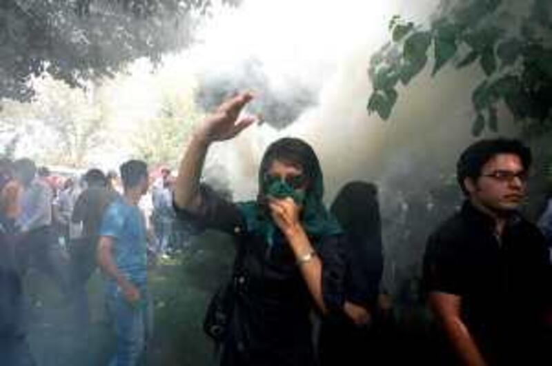An Iranian female opposition supporter reacts as she attends a protest in Tehran, Iran, Friday, Sept. 18, 2009, in competition with government-sponsored mass rallies to mark an annual anti-Israel commemoration, the Quds Day that reflects the Persian nation's sympathy with the Palestinians. (AP Photo) *** Local Caption ***  VAH120_APTOPIX_Mideast_Iran_.jpg *** Local Caption ***  VAH120_APTOPIX_Mideast_Iran_.jpg