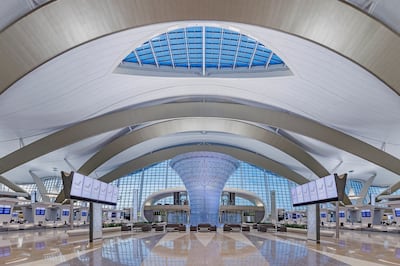 Terminal A at Abu Dhabi International Airport. Passengers can navigate through immigration and boarding processes without the need for documents. Photo: Abu Dhabi Airports