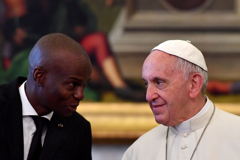 Pope Francis talks with Haiti's President Jovenel Moise during at the Vatican in January 2018.