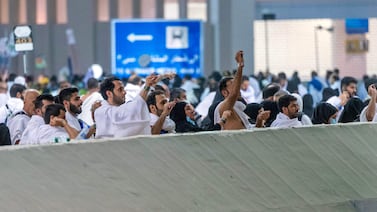 This handout picture provided by the Saudi Press Agency SPA on June 28, 2023 shows Muslim pilgrims performing the symbolic stoning of the devil ritual, as part of the Hajj pilgrimage in Mina near Saudi Arabia's holy city of Mecca.  (Photo by SPA  /  AFP)  /  === RESTRICTED TO EDITORIAL USE - MANDATORY CREDIT "AFP PHOTO  /  HO  /  SPA" - NO MARKETING NO ADVERTISING CAMPAIGNS - DISTRIBUTED AS A SERVICE TO CLIENTS ===