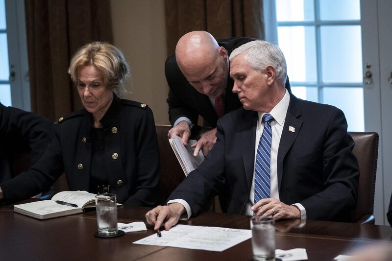 (FILES) In this file photo taken on March 2, 2020 (L-R) Debbie Birx, White House Corona Virus Response Coordinator, looks on as Vice President Mike Pence and his chief of staff Mark Short confer during a meeting with the White House Coronavirus Task Force and pharmaceutical executives in Cabinet Room of the White House in Washington, DC.  October 24, Marc Short, Chief of Staff to the Vice President, tested positive for Covid-19. / AFP / GETTY IMAGES NORTH AMERICA / Drew Angerer
