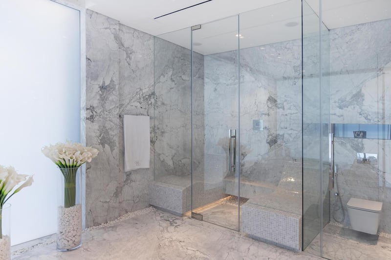 Italian marble in the spacious bathroom. Courtesy Luxhabitat Sotheby's International Realty
