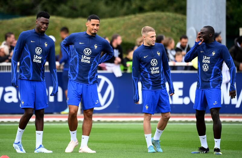 France defenders Benoit Badiashile, William Saliba, Adrien Truffert and forward Randal Kolo Munani during training. France face Austria at Stade de France on Friday before travelling to Denmark on Sunday. AFP