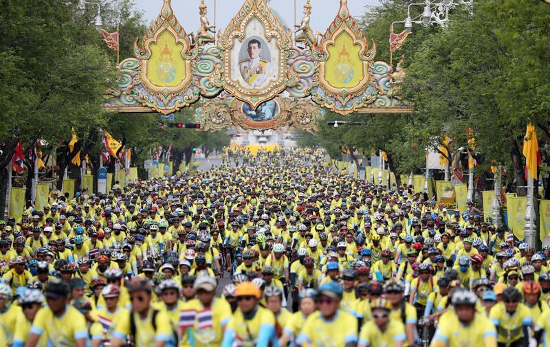Participants are seen ahead of the 'Bike Un Ai Rak or Bike Love and Warmth' mass cycling event in Bangkok, Thailand. Reuters