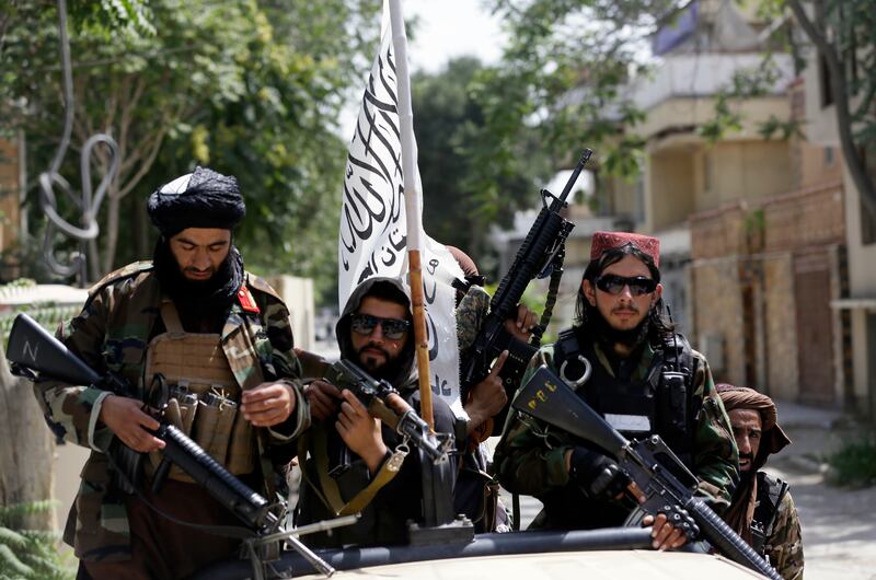 Taliban fighters on patrol in Kabul, Afghanistan, in 2021. Three women and nine men were lashed by the Taliban in front of hundreds of spectators near the city on Wednesday. AP