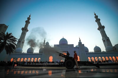 A cannon is fired at Sheikh Zayed Grand Mosque in Abu Dhabi each day to mark the end of the day's fasting. Victor Besa / The National