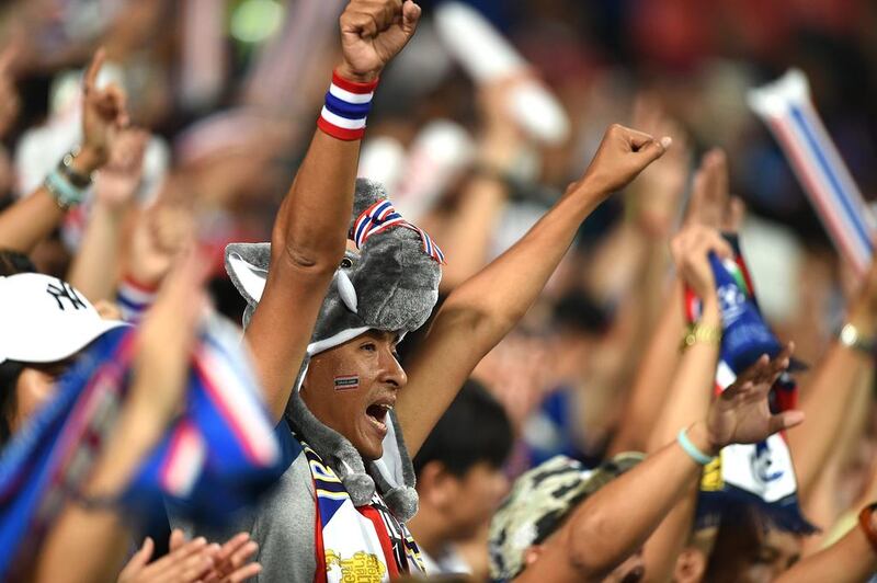 Supporters of Thailand cheer during the match. Tom Dulat / Getty Images
