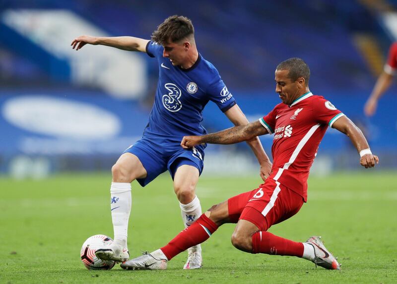 Liverpool's Thiago in action with Chelsea's Mason Mount. Reuters