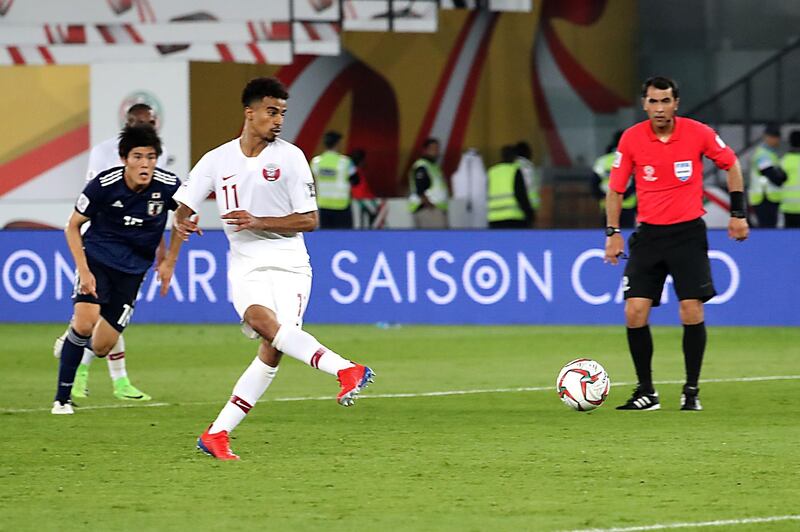 Qatar's forward Akram Afif (2nd-L) takes a penalty during the 2019 AFC Asian Cup final football match between Japan and Qatar at the Mohammed Bin Zayed Stadium in Abu Dhabi on February 1, 2019.  / AFP / Karim Sahib
