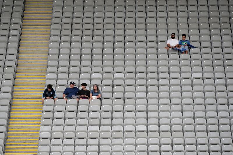 A few supporters surrounded by empty seats due to COVID-19 crowd restrictions during the round 3 Super Rugby Pacific match between the Blues and the Chiefs at Eden Park on March 05, 2022 in Auckland, New Zealand. Getty Images