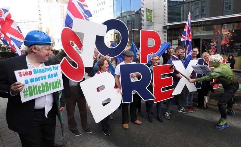Britain's Prime Minister Boris Johnson's look-alike attends a "Stop Brexit" protest. Reuters