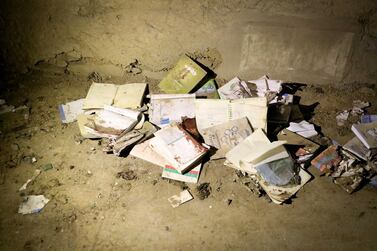 Bloodstained books and notebooks of students are seen on the ground at the scene of a suicide attack that targeted an educational center 'Kohsar Danesh' in Kabul, Afghanistan, October 24, 2020. EPA