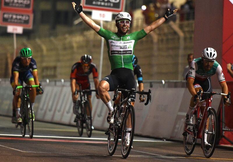 Mark Cavendish of Great Britain and Team Dimension Data celebrates winning the stage. Tom Dulat / Getty Images