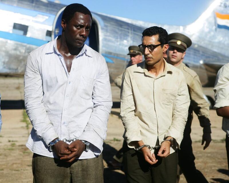 Idris Elba, left, stars as Nelson Mandela in the film ‘Mandela: Long Walk to Freedom’ which had a gala screening in the Dubai International Film Festival on Monday, the same day that South Africa held a memorial service for its former president Nelson Mandela. AP Photo