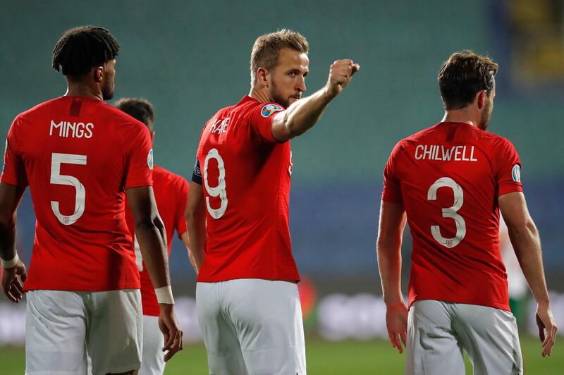 Harry Kane, center, celebrates after scoring his side's sixth goal during the Euro 2020 Group A qualifying match against Bulgaria. AP