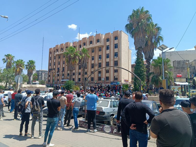 Anti-government protesters gather in Sweida, south-west Syria, after a sharp rise in fuel costs. Reuters