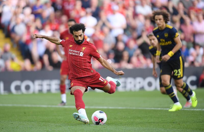 LIVERPOOL, ENGLAND - AUGUST 24: Mohamed Salah of Liverpool scores from the penalty spot during the Premier League match between Liverpool FC and Arsenal FC at Anfield on August 24, 2019 in Liverpool, United Kingdom. (Photo by Laurence Griffiths/Getty Images)