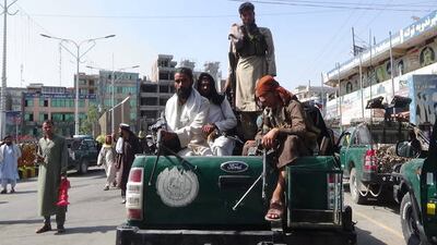 Taliban members patrol the streets of Jalalabad city. Getty Images