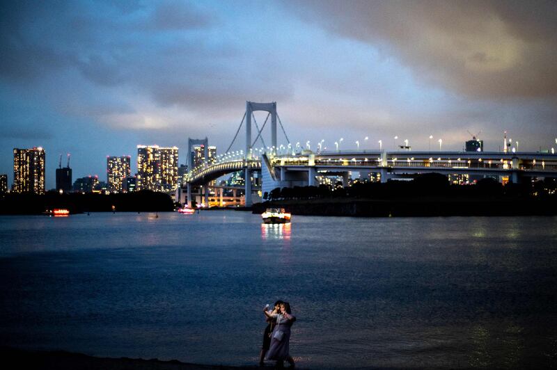 Selfies at Odaiba Marine Park in Tokyo. AFP