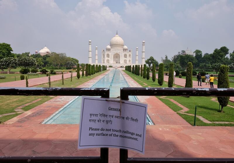 A notice is tied to a railing inside the premises of Taj Mahal after authorities reopened the monument for visitors, amidst the coronavirus disease (COVID-19) outbreak, in Agra, India, September 21, 2020. REUTERS/Alasdair Pal