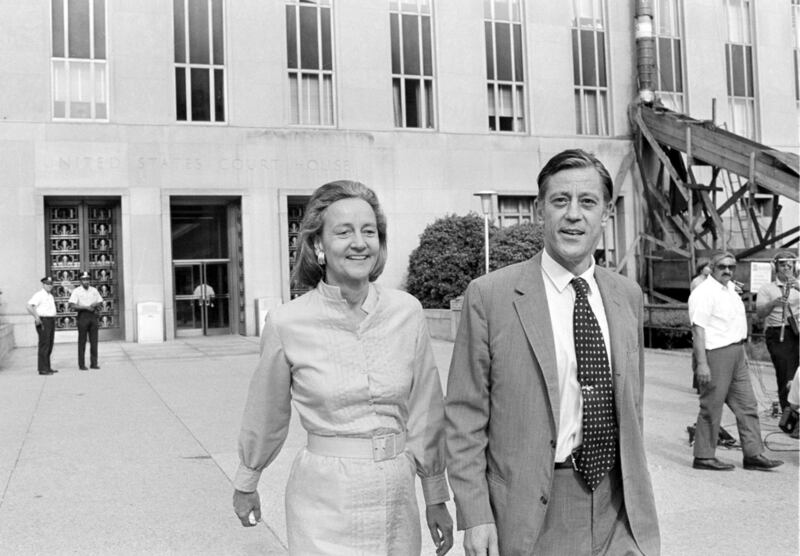 Former 'Washington Post’s' executive editor Ben Bradlee and publisher Katharine Graham seen leaving the US district court in Washington. AP
