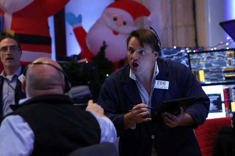 Traders on the floor of the New York Stock Exchange. The S&P 500 settled less than 0.1% lower on Friday, but notched its seventh winning week in a row and its best show since 2017. Reuters