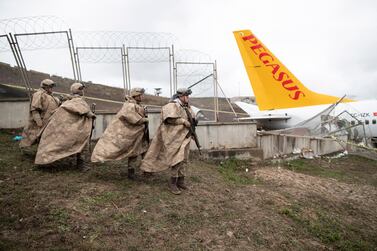  Pegasus Airlines aircraft skidded off the Sabiha Goekcen airport runway in Istanbul,  killing three people and injuring 157 others. EPA/TOLGA BOZOGLU