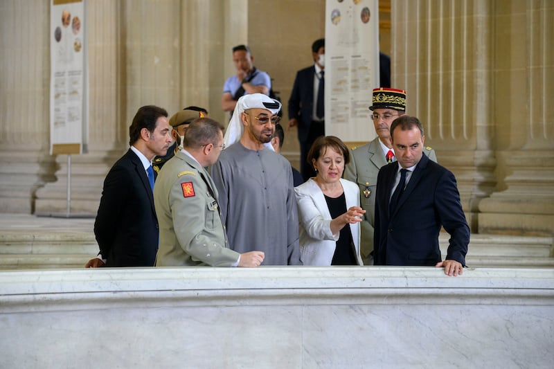 Sheikh Mohamed with Sheikh Hazza bin Zayed, vice chairman of the Abu Dhabi Executive Council, and Mr Le Cornu at the military museum. Photo: Presidential Court