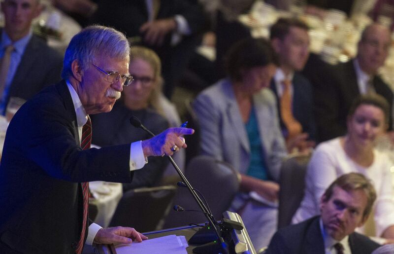 US National Security Advisor, John Bolton, speaks to the Federalist Society  in Washington DC on September 10, 2018. - The United States threatened Monday, September 10, 2018 to arrest and sanction judges and other officials of the International Criminal Court if it moves to charge any American who served in Afghanistan with war crimes. White House National Security Advisor John Bolton called the Hague-based rights body "unaccountable" and "outright dangerous" to the United States, Israel and other allies, and said any probe of US service members would be "an utterly unfounded, unjustifiable investigation." (Photo by ANDREW CABALLERO-REYNOLDS / AFP)