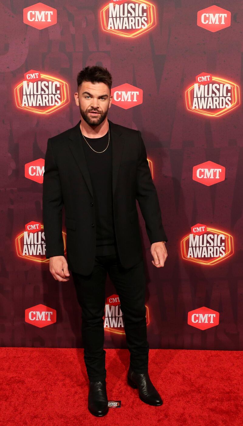 Singer Dylan Scott arrives for the CMT Music Awards at Bridgestone Arena in Nashville, Tennessee, on June 9, 2021. Reuters