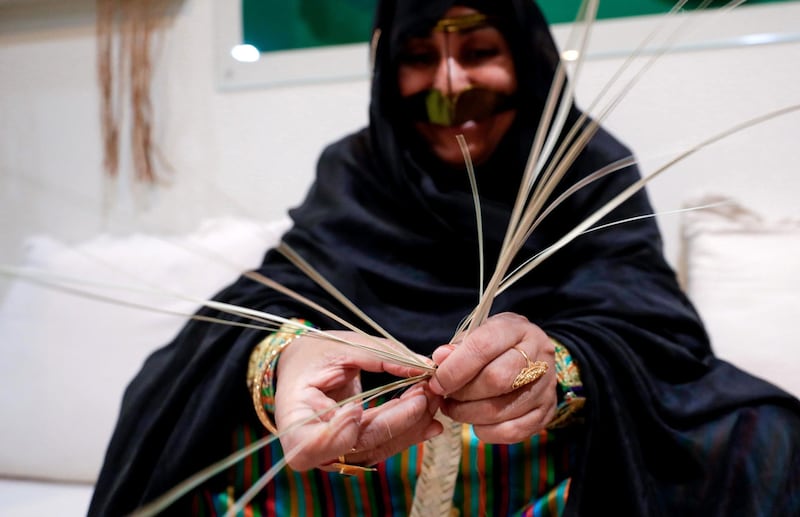 Abu Dhabi, United Arab Emirates, May 18, 2019. –  ‘Ramadan at Al Hosn’, which aims to revive the authentic traditions of Ramadan by recalling the memories rooted in our past, when the people of Abu Dhabi gathered at Qasr Al Hosn to celebrate the holy month. -- KHOOS, weaving or braiding together of date palm fronds to form an object at the House of Artisans, Qasr Al Hosn.
Victor Besa/The National
Section:  NA
Reporter: