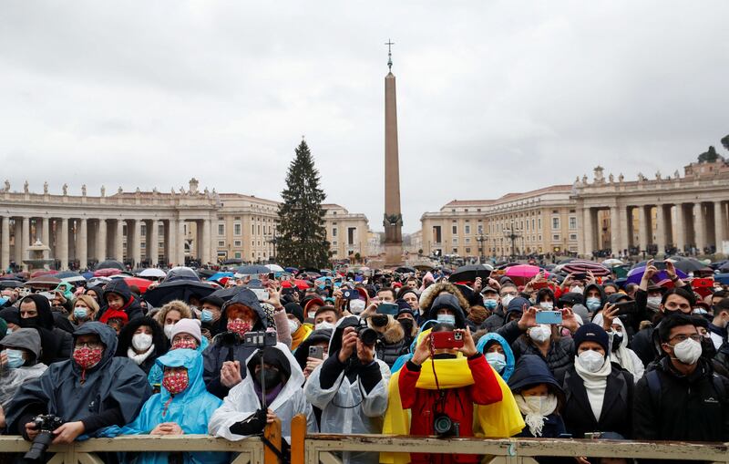 Worshippers gather in St Peter’s Square, Vatican City, to hear the Pope’s Christmas address. Reuters