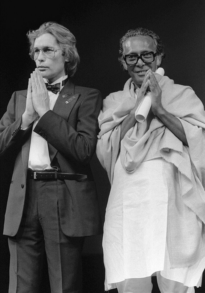 Indian film director Mrinal Sen, right, was the first Indian to serve on the Cannes jury, in 1982. Here he is accompanied by German actor Helmut Berger as he's awarded the Jury Prize for his film 'Kharij' in May 1983. Photo: AFP