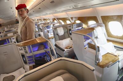 SCHOENEFELD, GERMANY - JUNE 01:  A stewardess waits to welcome visitors in the business class section on board an Emirates A380 passenger plane at the ILA 2016 Berlin Air Show on June 1, 2016 in Schoenefeld, Germany. The ILA 2016 will be open to visitors from June 1-4.  (Photo by Sean Gallup/Getty Images)