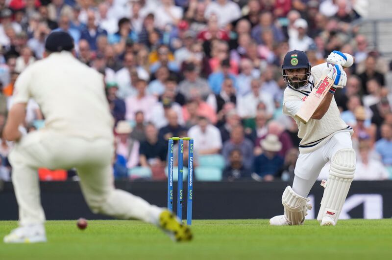 India captain Virat Kohli plays a shot off the bowling of England's Ollie Robinson. AP
