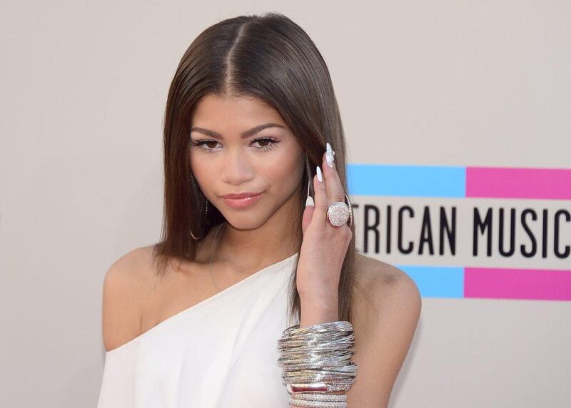 Actress Zandaya arrives for the 2013 American Music Awards at the Nokia Theatre in downtown Los Angeles, California. Frederic J. Brown / AFP Photo