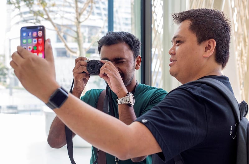 DUBAI, UNITED ARAB EMIRATES, 21 SEPTEMBETR 2018 - iPhone fans at the launch of iPhone XS at Apple store, Dubai Mall.  Leslie Pableo for The National for Alkesh Sharma’s story