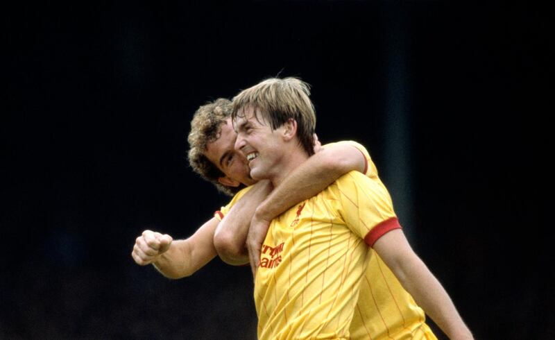 LONDON, ENGLAND - SEPTEMBER 10: Liverpool player Kenny Dalglish is congratulated by Graeme Souness after scoring in a First Division match against Arsenal at Highbury on September 10, 1983 in London, United Kingdom. (Photo by Trevor Jones/Allsport/Getty Images/Hulton Archive)