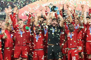 Liverpool players celebrate with the trophy after winning the Fifa Club World Cup 2019. EPA