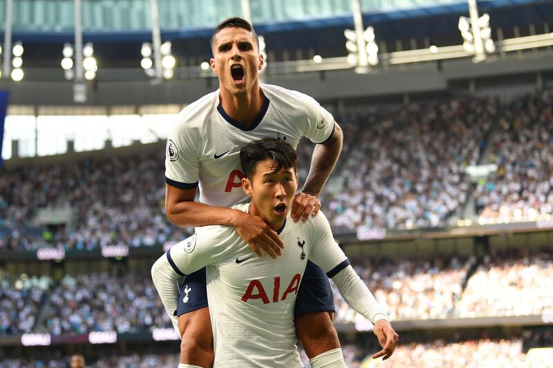 Son Heung-min (bottom) celebrates with teammate Erik Lamela after scoring Tottenham's first goal in a 4-0 victory over Crystal Palace at the Tottenham Hotspur Stadium. AFP